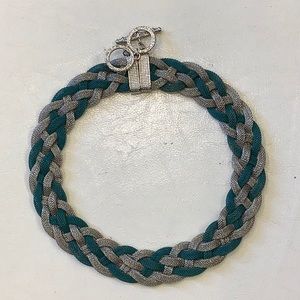 Braided silver and teal necklace with magnetic closure.